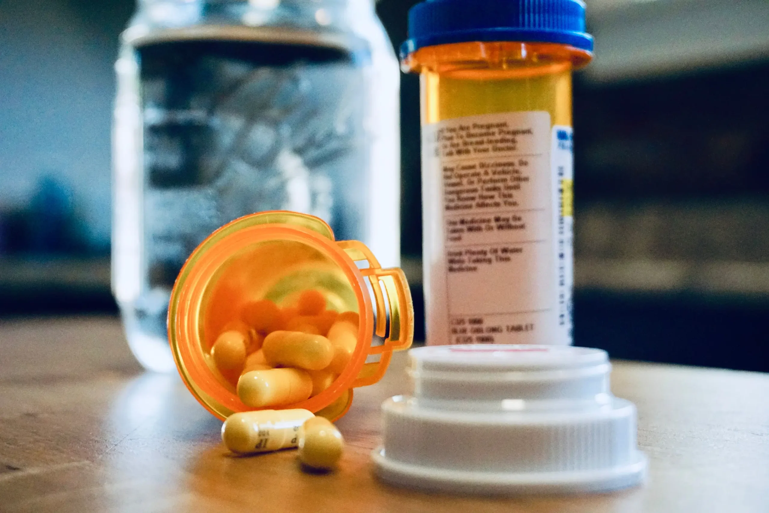 Adderall prescription bottle spilled out symbolizing the need for adderall addiction treatment in Fresno.